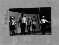 <span itemprop="name">A group of students dancing and singing at the...</span>