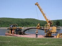 <span itemprop="name">A Canal Authority scow crew removes trees and...</span>