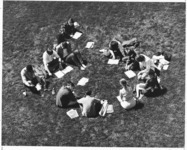 <span itemprop="name">Unidentified students sitting in a circle on the...</span>