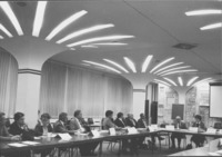 <span itemprop="name">Unidentified people attending a training meeting...</span>