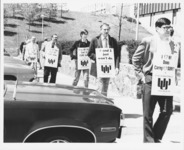 <span itemprop="name">A group of unidentified people walking a picket...</span>