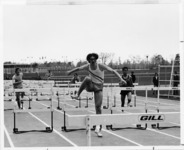 <span itemprop="name">A picture of a men's hurdles race in progress...</span>