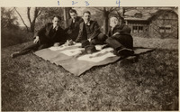 <span itemprop="name">Four students seated outdoors. The second student...</span>