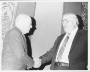 <span itemprop="name">Eugene Link (left) and Fred Lambert shaking hands...</span>