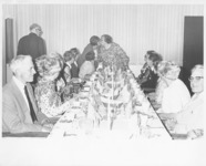 <span itemprop="name">A group of people attending the dinner for the...</span>
