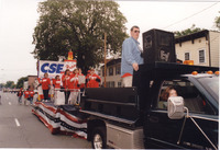 <span itemprop="name">Daniel Campbell riding in a truck pulling a float...</span>