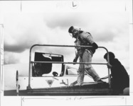 <span itemprop="name">An unidentified pilot steps into an unidentified...</span>