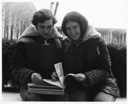 <span itemprop="name">Two unidentified students looking at a book at the...</span>