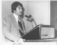 <span itemprop="name">Tom Hobart speaking into a microphone at a NYSUT...</span>