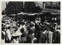 <span itemprop="name">A crowded market scene, with lots of people, and a...</span>