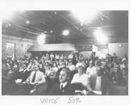 <span itemprop="name">A large group of people attending a meeting...</span>