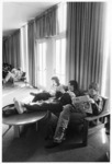<span itemprop="name">Unidentified students sitting in the Campus Center...</span>