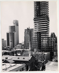 <span itemprop="name">Two tall buildings under construction....</span>