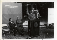 <span itemprop="name">Page 181 A-Top: Groundbreaking for the Freedom Quad.  Albany Mayor Thomas M. Whalen is at the podium, with President O'Leary and University Council Chair Alan V. Iselin seated.</span>