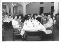 <span itemprop="name">Seated at a table, right to left, are: Herbert...</span>