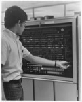 <span itemprop="name">An unidentified man operating a computing system...</span>