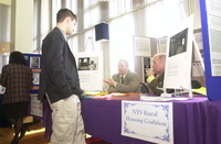 <span itemprop="name">Unidentified persons speaking at a booth for the...</span>