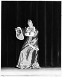 <span itemprop="name">A picture of a female student as she performs on...</span>