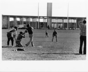 <span itemprop="name">A picture of students engaging in a baseball game...</span>