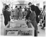 <span itemprop="name">Unidentified people looking at the library...</span>