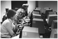 <span itemprop="name">Unidentified people using computers in the State...</span>