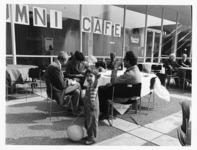 <span itemprop="name">People seated at the Alumni Café during Community-...</span>