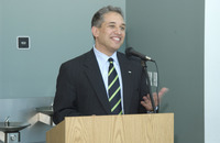 <span itemprop="name">An unidentified man speaks at an event honoring...</span>