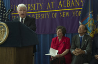 <span itemprop="name">An unidentified person speaks at the podium while...</span>