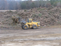 <span itemprop="name">A Brookhaven bucket loader is dwarfed by a hill of...</span>