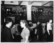 <span itemprop="name">Students attending a dance in the Commons, the...</span>