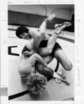<span itemprop="name">A picture of two wrestlers engaged in a practice...</span>