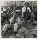 <span itemprop="name">Two young boys in hats holding thin wooden rods....</span>