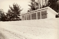<span itemprop="name">A winter scene of a bus stop covered in snow on...</span>