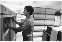 <span itemprop="name">An unidentified man operating a computing system...</span>