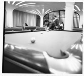 <span itemprop="name">An unidentifed student playing pool in the...</span>