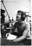 <span itemprop="name">An unidentified man working in a radio station...</span>