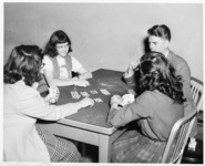 <span itemprop="name">An unidentified group of students playing a card...</span>
