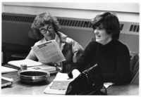 <span itemprop="name">Two unidentified students attending a class at the...</span>