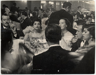 <span itemprop="name">A packed banquet hall scene of well dressed men...</span>