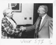 <span itemprop="name">Sam Wakshull (left) shaking hands with an...</span>