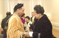 <span itemprop="name">Two unidentified women attend the dedication...</span>
