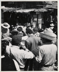 <span itemprop="name">A crowd of people at the market....</span>