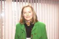 <span itemprop="name">An unidentified keynote speaker pauses for a photo...</span>