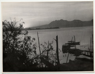 <span itemprop="name">A dock and lake at sunrise. "Sunrise at Janitzio...</span>