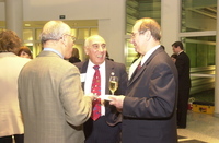<span itemprop="name">Carl Rosner speaks with two unidentified persons...</span>