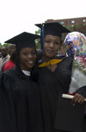 <span itemprop="name">Two new University at Albany graduates attend the...</span>