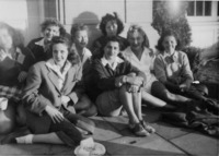 <span itemprop="name">A group of eight female students sitting together...</span>