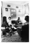 <span itemprop="name">Unidentified students talking in a dormitory at...</span>