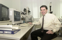 <span itemprop="name">New employee Ken Roff poses for a photo for the...</span>