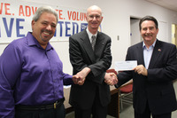 <span itemprop="name">Brian Hassett, center, from the United Way of the...</span>